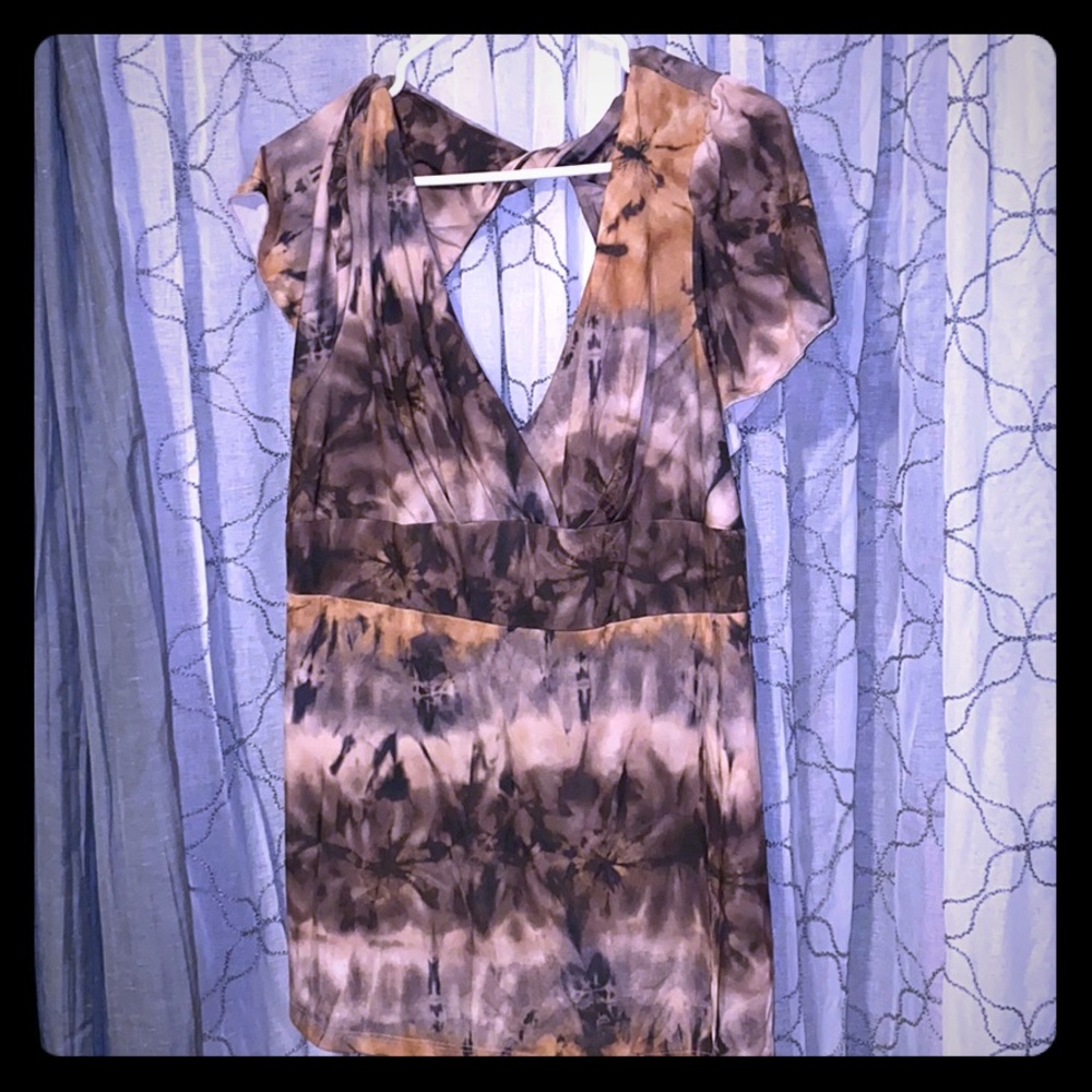 Large peep whole tie dye blouse